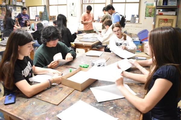 Members assembling the jellyfish mental health kits
